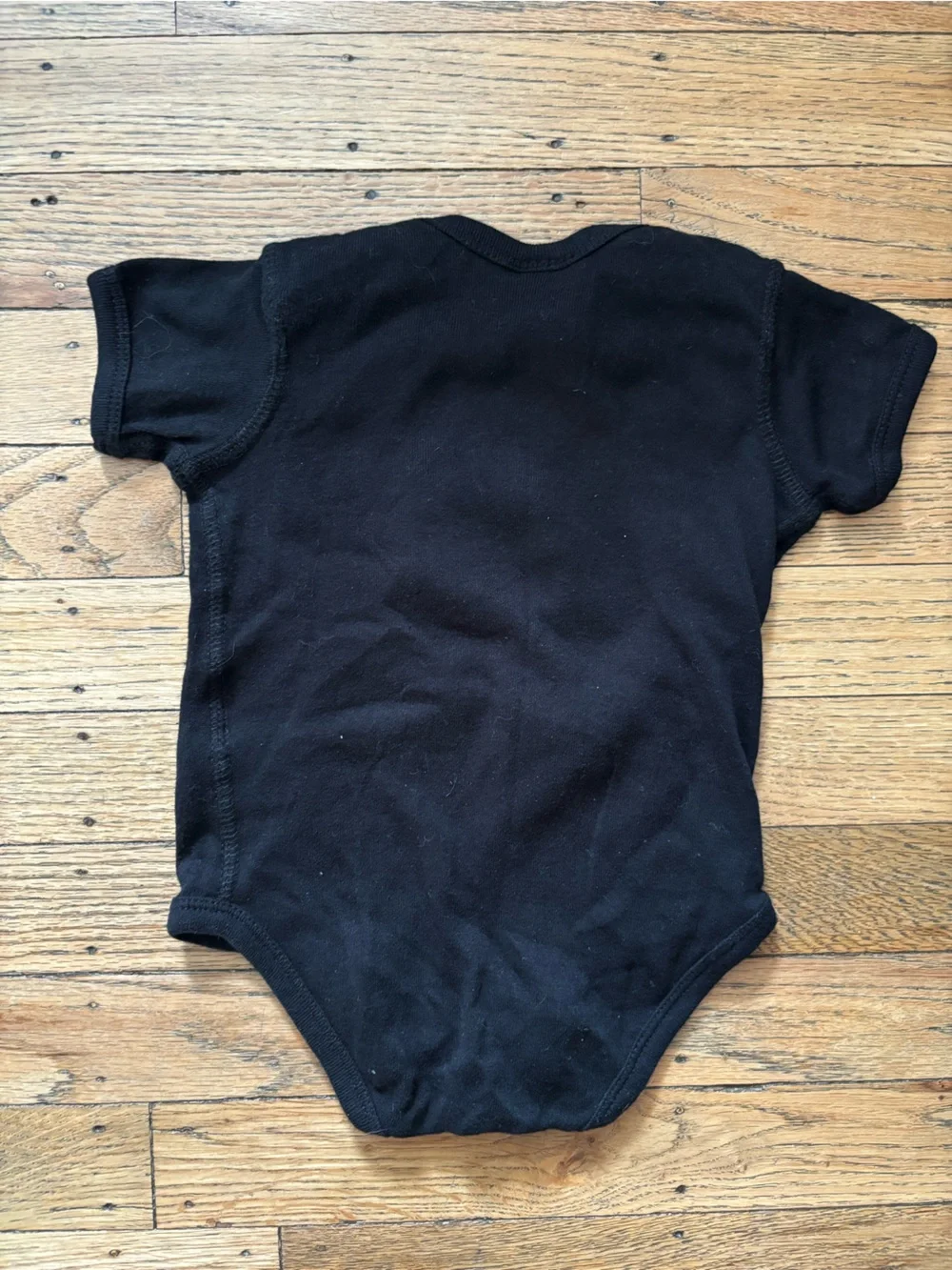 Santa Cruz Black Baby Bodysuit with Blue Screaming Hand Graphic